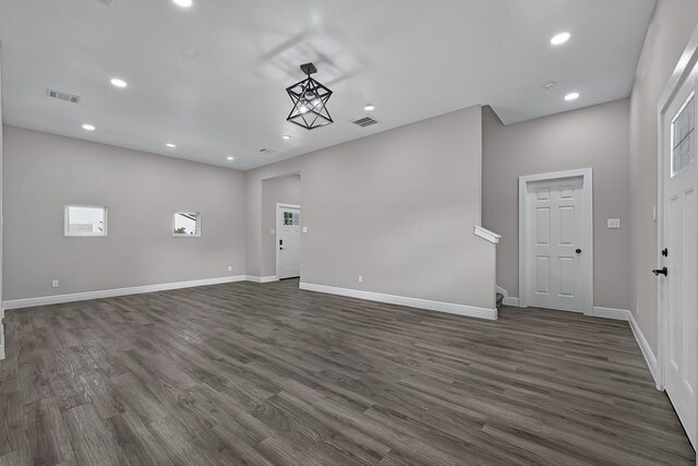 9805 Fabiola Dr, Houston, TX 77075 - foyer entrance with dark wood-type flooring, recessed lighting, and baseboards