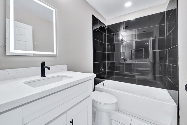 9805 Fabiola Dr, Houston, TX 77075 - full bathroom with toilet, vanity, and shower / tub combination