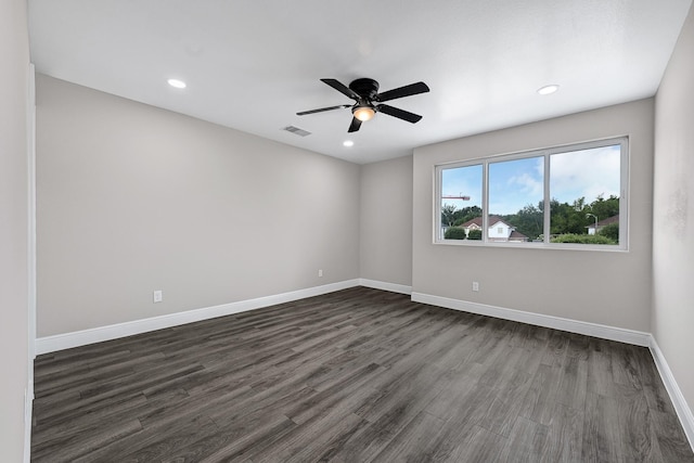 9805 Fabiola Dr, Houston, TX 77075 - unfurnished room with dark wood-style flooring, baseboards, a ceiling fan, and recessed lighting