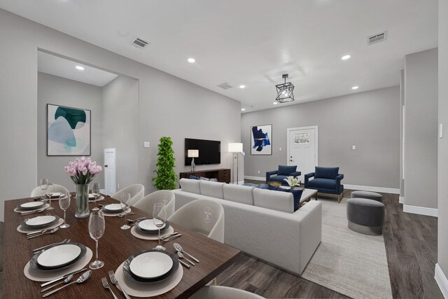 9805 Fabiola Dr, Houston, TX 77075 - dining area with wood finished floors, recessed lighting, and baseboards