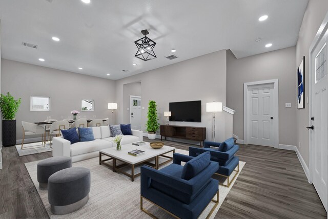 9805 Fabiola Dr, Houston, TX 77075 - living room featuring wood finished floors, recessed lighting, and baseboards
