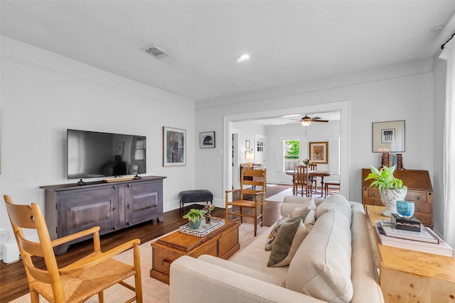 1618 Lawrence St, Houston, TX 77008 - living area with wood finished floors, a ceiling fan, and baseboards