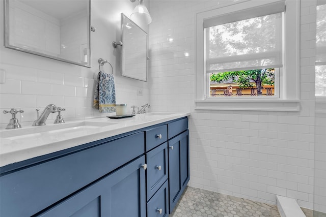 1618 Lawrence St, Houston, TX 77008 - bathroom featuring double vanity, tile walls, and tile patterned floors