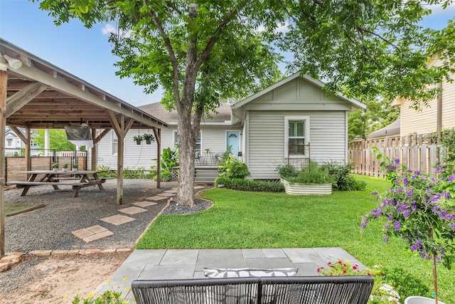 1618 Lawrence St, Houston, TX 77008 - view of front facade with a patio area and board and batten siding