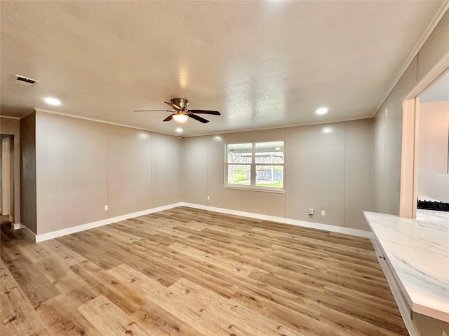 7845 Bonaire St, Houston, TX 77028 - unfurnished room featuring crown molding, ceiling fan, light wood-style flooring, recessed lighting, and baseboards
