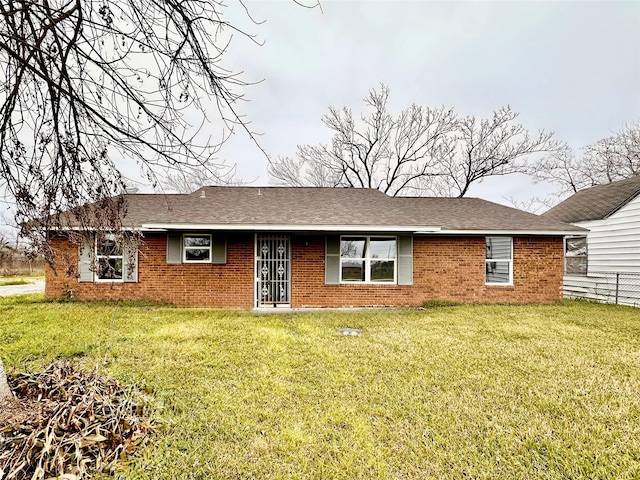 7845 Bonaire St, Houston, TX 77028 - view of front of property with brick siding and a shingled roof