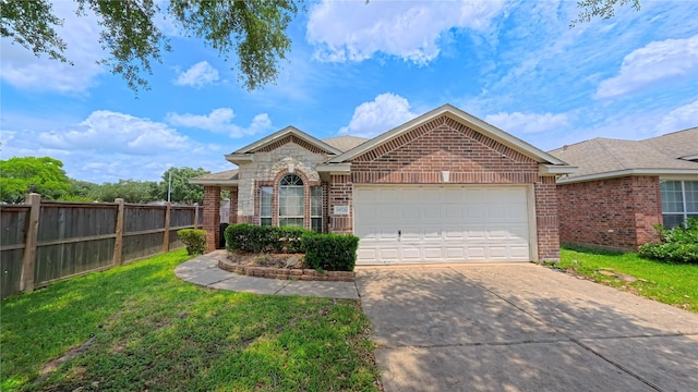 19726 Imperial Colony Ln, Katy, TX 77449 - view of front of home with brick siding, concrete driveway, and a garage
