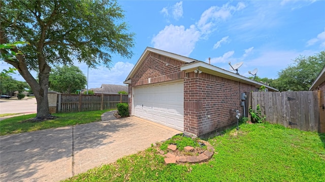 19726 Imperial Colony Ln, Katy, TX 77449 - view of side of home featuring brick siding and a garage