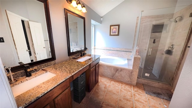 19726 Imperial Colony Ln, Katy, TX 77449 - full bath featuring lofted ceiling, double vanity, a stall shower, a bath, and tile patterned floors