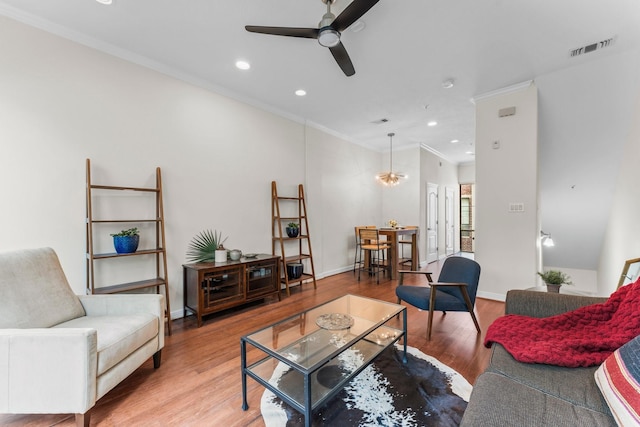 118 Mcgowen St Unit E, Houston, TX 77006 - living room with ceiling fan, ornamental molding, light wood-type flooring, recessed lighting, and baseboards