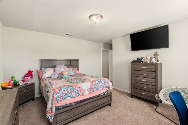 8219 Delta Down Dr, Fulshear, TX 77441 - bedroom with light colored carpet and baseboards