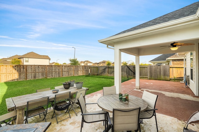 8219 Delta Down Dr, Fulshear, TX 77441 - view of patio / terrace with outdoor dining space and a ceiling fan