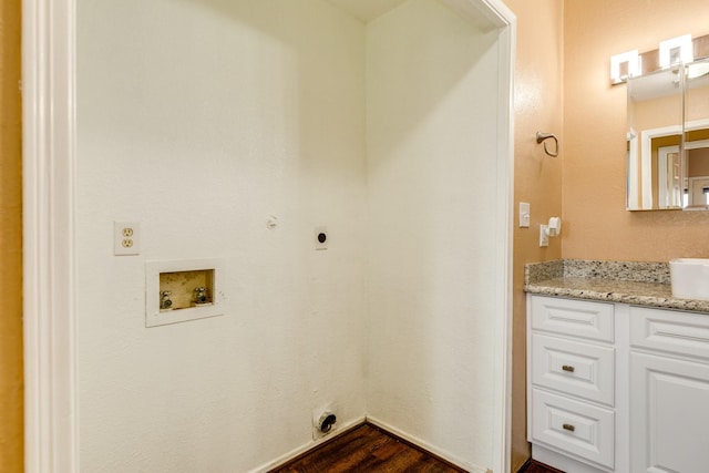 500 Ferry Rd Unit 434D, Galveston, TX 77550 - washroom featuring electric dryer hookup, gas dryer hookup, washer hookup, and dark wood finished floors
