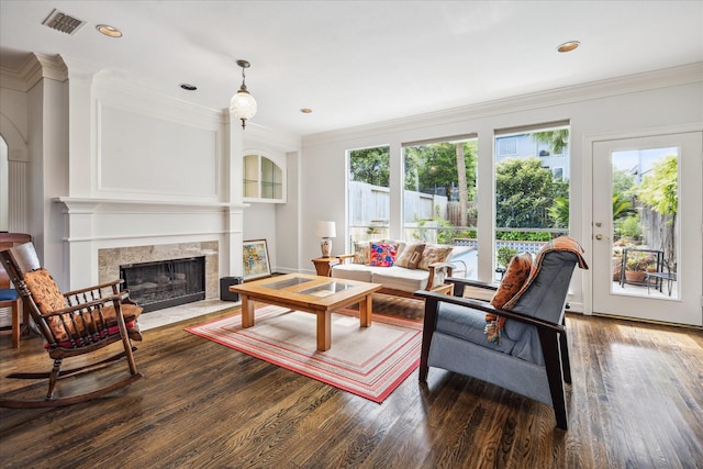 1202 Marconi St, Houston, TX 77019 - living room featuring wood finished floors, a high end fireplace, crown molding, and recessed lighting