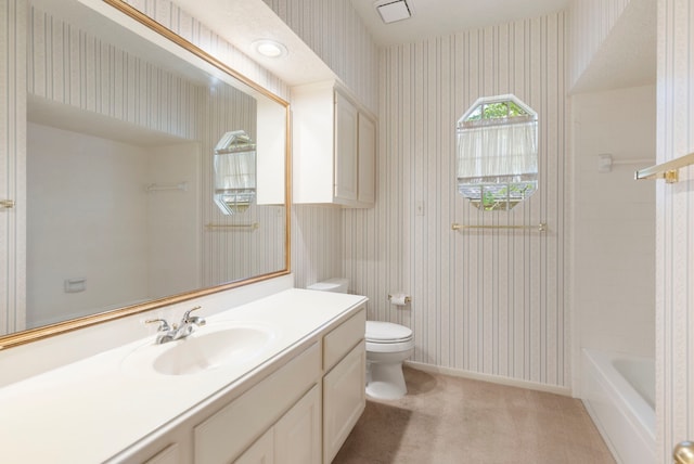 127 S Copperknoll Cir, The Woodlands, TX 77381 - full bathroom with wallpapered walls, toilet, vanity, baseboards, and bathtub / shower combination