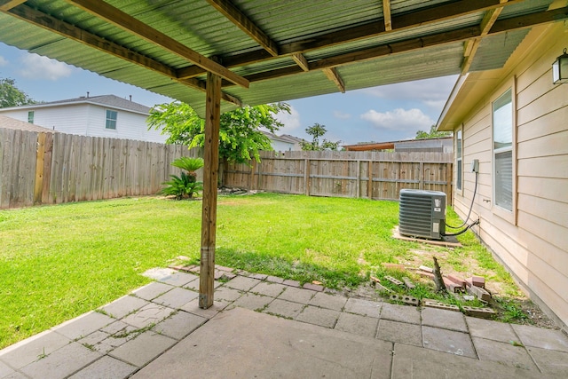 12518 Rosslare Dr, Houston, TX 77066 - view of yard featuring central air condition unit and a patio
