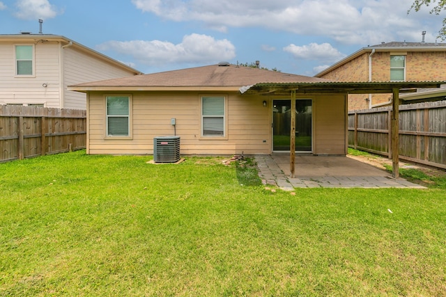 12518 Rosslare Dr, Houston, TX 77066 - rear view of property featuring a patio and central AC unit