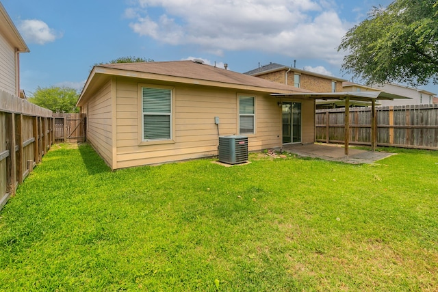 12518 Rosslare Dr, Houston, TX 77066 - rear view of house with a patio and central AC unit
