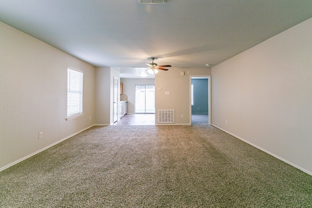 12518 Rosslare Dr, Houston, TX 77066 - spare room with ceiling fan, carpet flooring, and baseboards