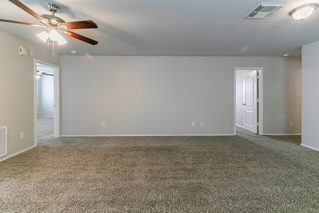 12518 Rosslare Dr, Houston, TX 77066 - spare room featuring ceiling fan, dark carpet, and baseboards