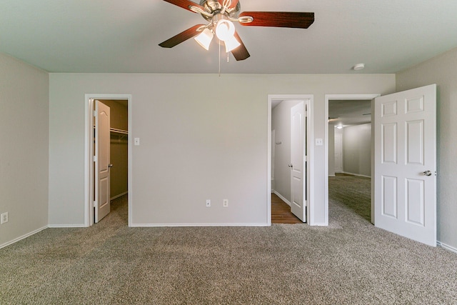 12518 Rosslare Dr, Houston, TX 77066 - unfurnished bedroom featuring carpet, a spacious closet, and baseboards