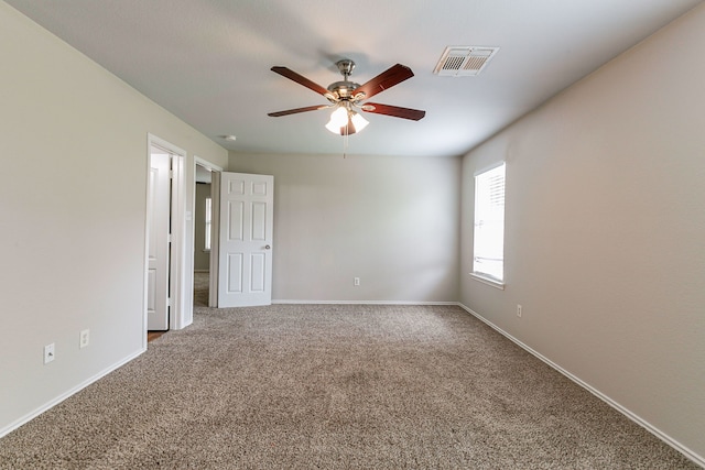 12518 Rosslare Dr, Houston, TX 77066 - spare room with a ceiling fan, carpet flooring, and baseboards