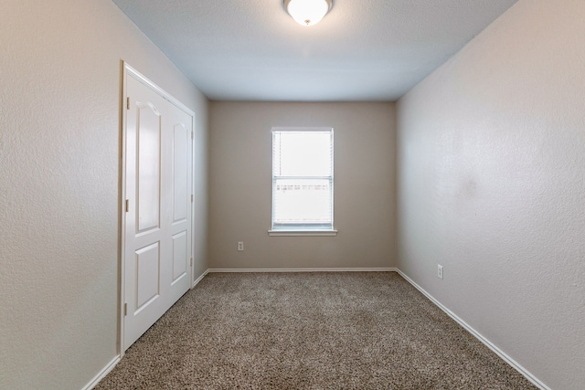 12518 Rosslare Dr, Houston, TX 77066 - carpeted spare room featuring baseboards