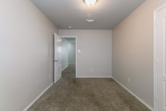 12518 Rosslare Dr, Houston, TX 77066 - spare room featuring carpet and baseboards