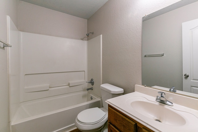 12518 Rosslare Dr, Houston, TX 77066 - bathroom featuring vanity, bathing tub / shower combination, toilet, and a textured wall
