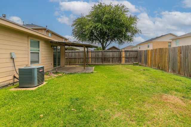 12518 Rosslare Dr, Houston, TX 77066 - view of yard with central AC and a patio area