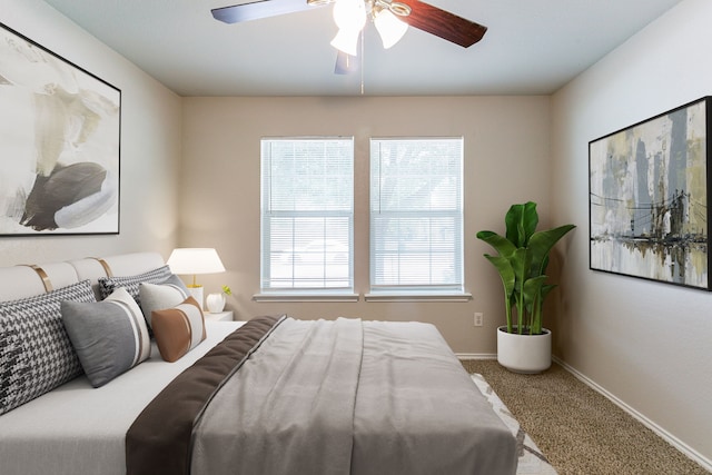 12518 Rosslare Dr, Houston, TX 77066 - bedroom with carpet, ceiling fan, and baseboards