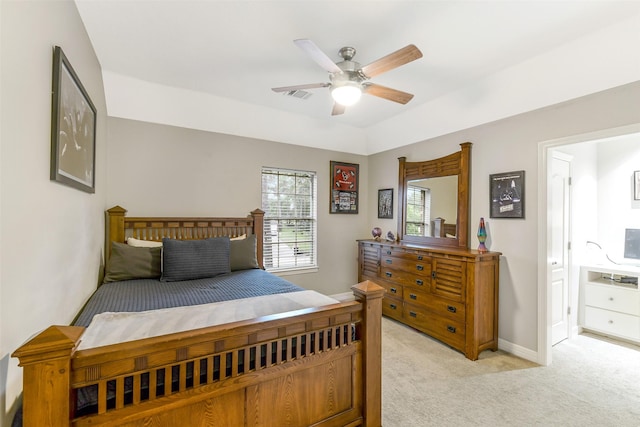 15912 Rosethorn Ct, Cypress, TX 77429 - bedroom featuring light carpet, ceiling fan, baseboards, and ensuite bath