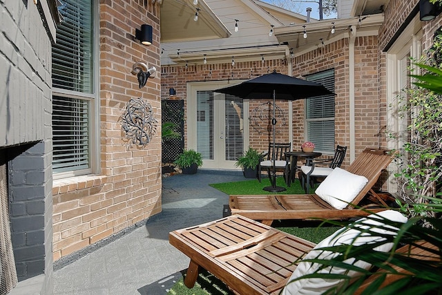 7 Heathcote Ct, The Woodlands, TX 77380 - view of patio / terrace featuring french doors