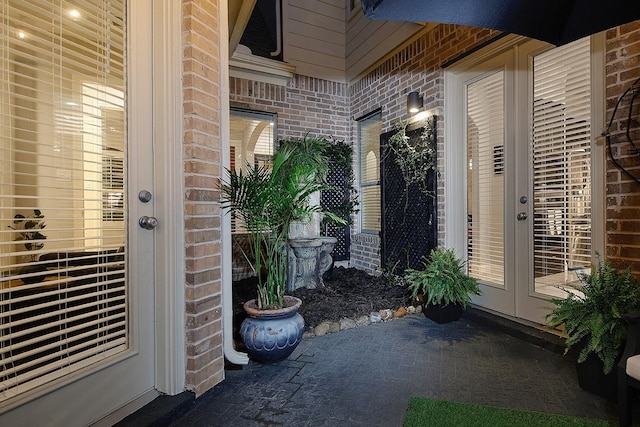 7 Heathcote Ct, The Woodlands, TX 77380 - entrance to property with brick siding and french doors
