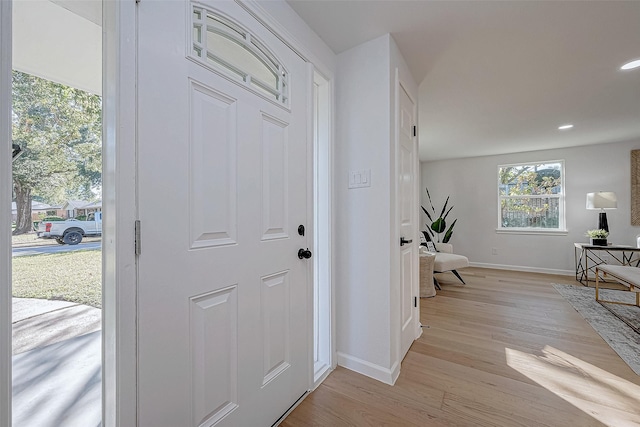 2414 Walnut Bend Ln, Houston, TX 77042 - foyer entrance featuring light wood-style flooring, baseboards, and recessed lighting
