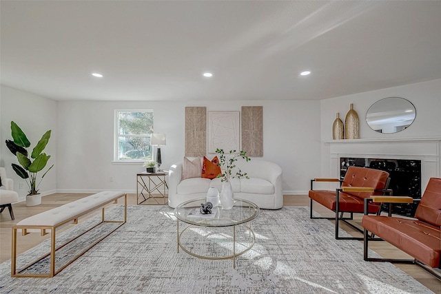 2414 Walnut Bend Ln, Houston, TX 77042 - living room featuring baseboards, recessed lighting, a fireplace, and wood finished floors