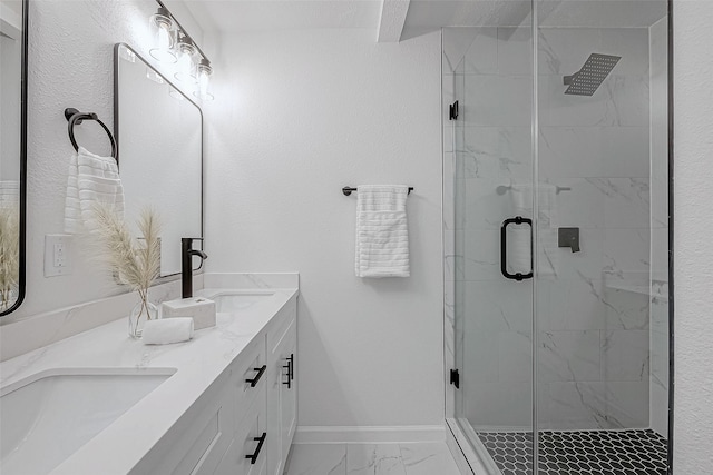 2414 Walnut Bend Ln, Houston, TX 77042 - full bathroom featuring double vanity, marble finish floors, a marble finish shower, and baseboards