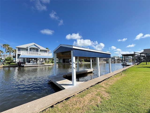 21735 Matagorda Dr, Galveston, TX 77554 - dock featuring a water view, a lawn, and boat lift