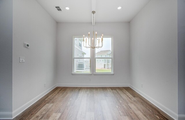 25814 Bay Breeze Dr, Galveston, TX 77554 - unfurnished room featuring a chandelier, wood finished floors, baseboards, and recessed lighting
