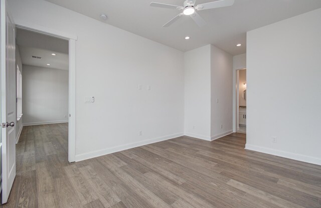 25814 Bay Breeze Dr, Galveston, TX 77554 - empty room featuring ceiling fan, wood finished floors, baseboards, and recessed lighting