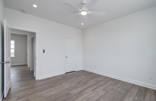 25814 Bay Breeze Dr, Galveston, TX 77554 - unfurnished room with wood finished floors, ceiling fan, baseboards, and recessed lighting