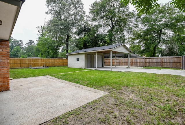 25635 Glen Loch Dr, Spring, TX 77380 - view of yard featuring a patio area, a carport, and an outdoor structure