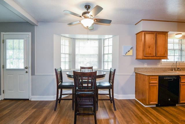 25635 Glen Loch Dr, Spring, TX 77380 - dining space featuring dark wood finished floors, ceiling fan, and baseboards