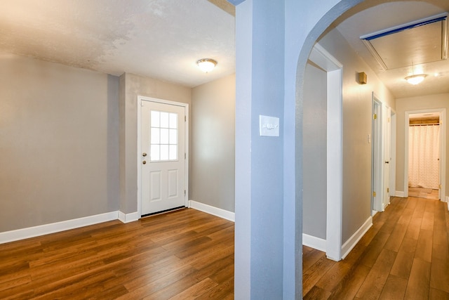25635 Glen Loch Dr, Spring, TX 77380 - entryway with dark wood finished floors and baseboards