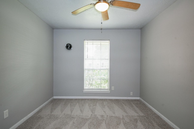 25635 Glen Loch Dr, Spring, TX 77380 - unfurnished room featuring healthy amount of natural light, ceiling fan, carpet, and baseboards