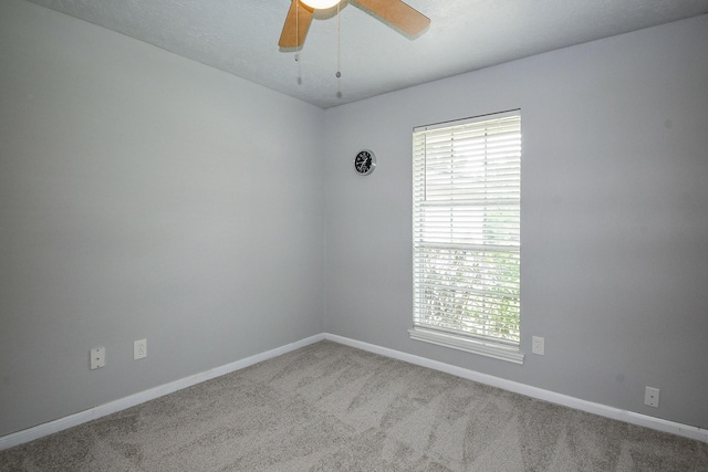 25635 Glen Loch Dr, Spring, TX 77380 - unfurnished room featuring carpet flooring, ceiling fan, and baseboards