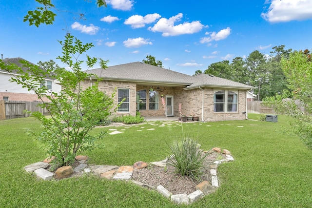 3307 Ellscott Ct, Spring, TX 77386 - back of property featuring brick siding and roof with shingles