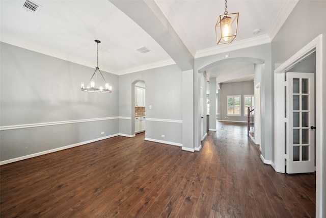 2935 Red Maple Dr, Katy, TX 77494 - foyer featuring arched walkways, dark wood-style floors, baseboards, crown molding, and a chandelier