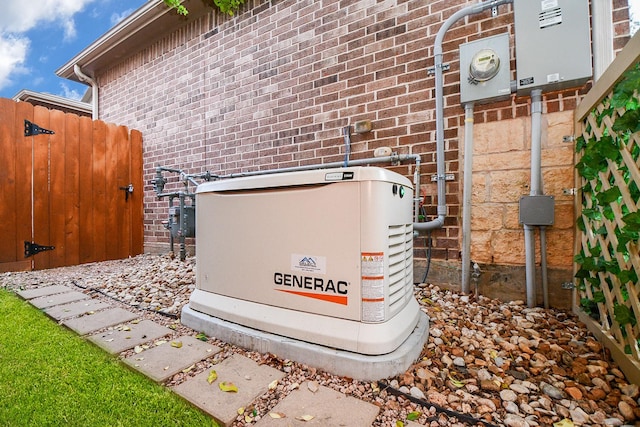 2935 Red Maple Dr, Katy, TX 77494 - exterior view of a power unit, brick siding, electric meter, and gas meter