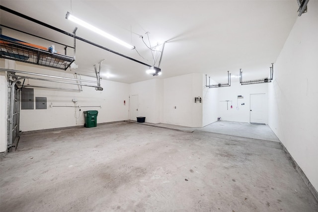 2935 Red Maple Dr, Katy, TX 77494 - garage with a garage door opener and electric panel